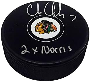 КРИС ЧЕЛИОС подписа шайбата Чикаго Блекхоукс - 2 шайби Норис с автограф в НХЛ